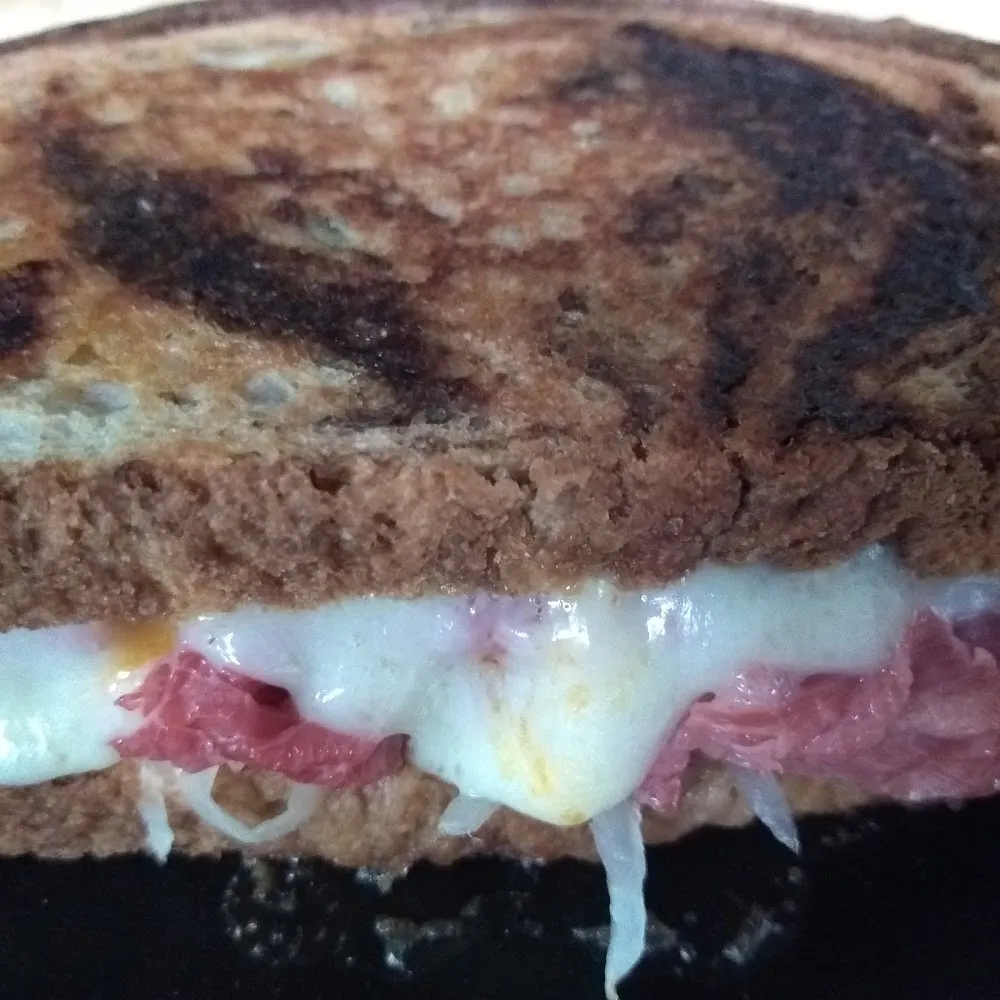 Reuben Sandwich on Rye Pumpernickel Swirled Bread Hot Off a Press